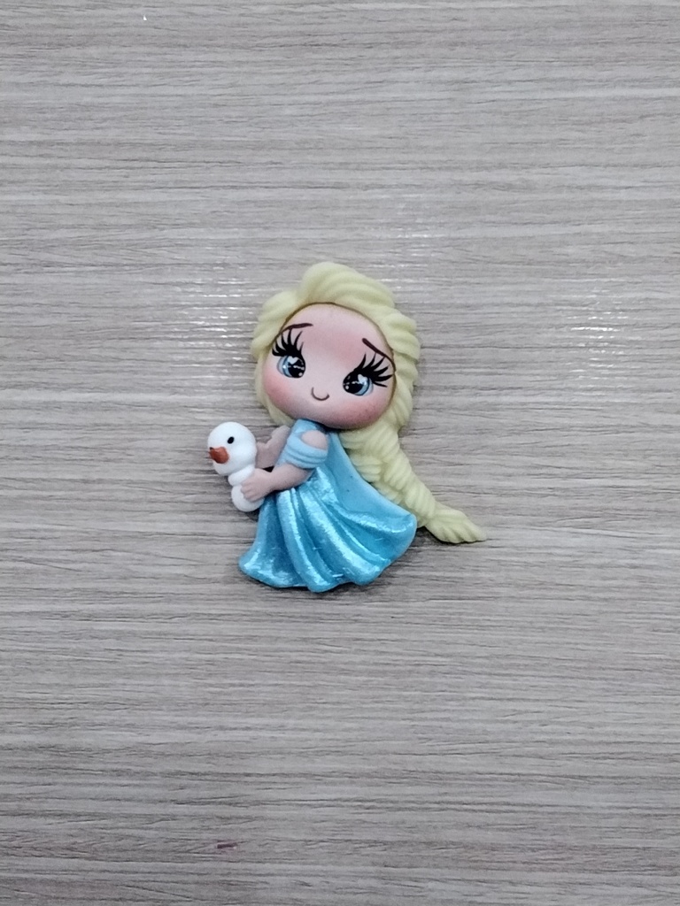 APLIQUE PORCELANA FRÍA PRINCESA ANA FROZEN COLOR CELESTE 5CM