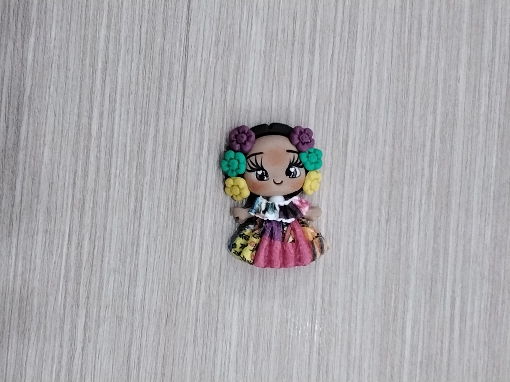 APLIQUE TÍPICO PORCELANA FRÍA MUÑECA CONGO