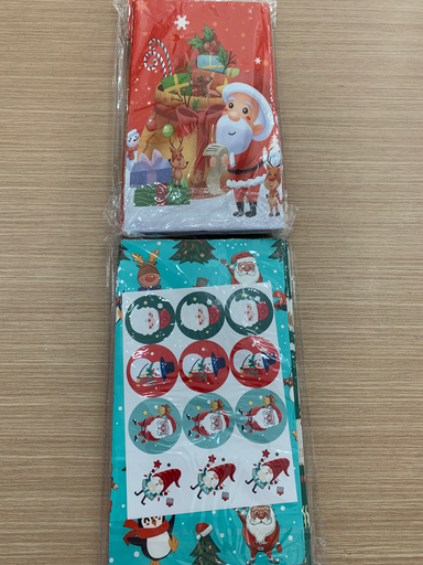 BOLSA NAVIDAD VARIOS DISEÑOS CON STICKERS PAQ 12 PIEZAS 24x13cm