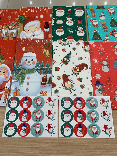 BOLSA NAVIDAD VARIOS MODELOS CON STICKERS 24x13cm
